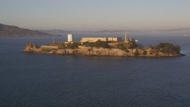 5K aerial stock footage of approaching Alcatraz prison San Francisco, California, sunset Aerial Stock Footage | DFKSF10_017