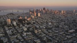 5K aerial stock footage approach Russian Hill apartment buildings and Downtown San Francisco skyscrapers, California, sunset Aerial Stock Footage | DFKSF10_045