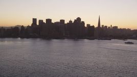 5K aerial stock footage of the Ferry Building and Downtown San Francisco skyline, California, sunset Aerial Stock Footage | DFKSF10_054