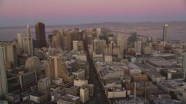 5K aerial stock footage of flying over Market Street through Downtown San Francisco, California, twilight Aerial Stock Footage | DFKSF10_059