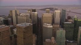 5K aerial stock footage follow Market Street past skyscrapers through Downtown San Francisco, California, twilight Aerial Stock Footage | DFKSF10_061