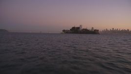 5K aerial stock footage of approaching Alcatraz at a low altitude, San Francisco, California, twilight Aerial Stock Footage | DFKSF10_069