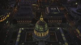 5K aerial stock footage approach city hall in Civic Center, tilt to opera house and theater, San Francisco, California, twilight Aerial Stock Footage | DFKSF10_080