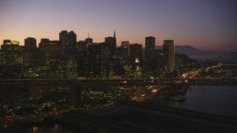 5K aerial stock footage of the city's skyline and Bay Bridge, Downtown San Francisco, California, twilight Aerial Stock Footage | DFKSF10_084