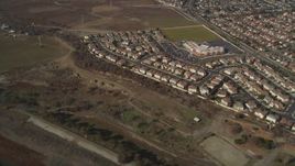 5K aerial stock footage of flying away from suburban tract homes, Union City, California Aerial Stock Footage | DFKSF11_003