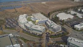 5K aerial stock footage of flying away from Yahoo! Campus office buildings in Sunnyvale, California Aerial Stock Footage | DFKSF11_026