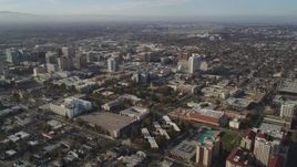 5K aerial stock footage of flying by San Jose State University and Downtown San Jose, California Aerial Stock Footage | DFKSF12_002