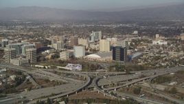 5K aerial stock footage of convention center in Downtown San Jose, California, seen from freeway interchange Aerial Stock Footage | DFKSF12_006
