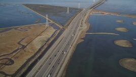 5K aerial stock footage of flying over Highway 84 freeway, revealing Dumbarton Bridge, Menlo Park, California Aerial Stock Footage | DFKSF12_031
