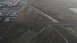 5K aerial stock footage of a reverse view of marshland, Hayward, California Aerial Stock Footage | DFKSF12_039