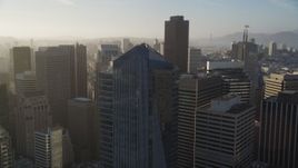 5K aerial stock footage of circling the Millennium Tower skyscraper in Downtown San Francisco, California Aerial Stock Footage | DFKSF13_018