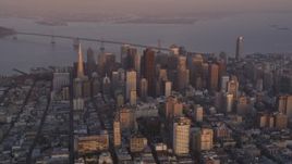 5K aerial stock footage of a view of city buildings and skyscrapers in Downtown San Francisco, California, sunset Aerial Stock Footage | DFKSF14_012