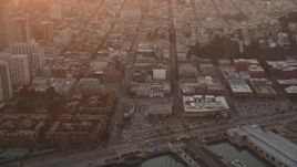 5K aerial stock footage tilt from North Beach apartments, reveal iconic Coit Tower, San Francisco, California, sunset Aerial Stock Footage | DFKSF14_018