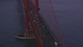 5K aerial stock footage of traffic on famous Golden Gate Bridge in San Francisco, California, twilight Aerial Stock Footage | DFKSF14_036