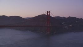 5K aerial stock footage of flying by Marin side of Golden Gate Bridge, San Francisco, California, twilight Aerial Stock Footage | DFKSF14_039