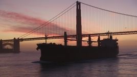 5K aerial stock footage of flying by an oil tanker near the Golden Gate Bridge, San Francisco, California, twilight Aerial Stock Footage | DFKSF14_048