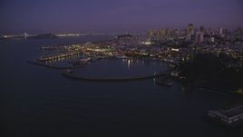 5K aerial stock footage of flying by the iconic Fisherman's Wharf, San Francisco, California, twilight Aerial Stock Footage | DFKSF14_056