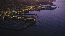5K aerial stock footage of flying away from Pier 39. and Fisherman's Wharf in San Francisco, California, twilight Aerial Stock Footage | DFKSF14_060