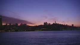 5K aerial stock footage of a view of Coit Tower and reveal Transamerica Pyramid, San Francisco, California, twilight Aerial Stock Footage | DFKSF14_067