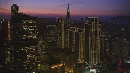 5K aerial stock footage pan across skyscrapers near Transamerica Pyramid in Downtown San Francisco, California, twilight Aerial Stock Footage | DFKSF14_070