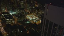 5K aerial stock footage flyby One Rincon Hill skyscraper toward bus station in Downtown San Francisco, California, night Aerial Stock Footage | DFKSF14_079
