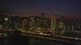 5K aerial stock footage of Downtown San Francisco's skyscrapers seen from the Bay Bridge, California, night Aerial Stock Footage | DFKSF14_092