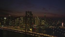 5K aerial stock footage of waterfront skyscrapers seen from Bay Bridge, Downtown San Francisco, California, night Aerial Stock Footage | DFKSF14_093