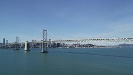 5K aerial stock footage of tilting from the bay revealing Bay Bridge and Downtown San Francisco, California Aerial Stock Footage | DFKSF15_005