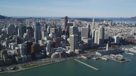 5K aerial stock footage of approaching waterfront skyscrapers and the Ferry Building in Downtown San Francisco, California Aerial Stock Footage | DFKSF15_008