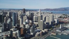 5K aerial stock footage of flying by the city's bay front skyscrapers in Downtown San Francisco, California Aerial Stock Footage | DFKSF15_009