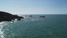 5K aerial stock footage of flying over San Francisco Bay, tilt to reveal Seal Rocks, San Francisco, California Aerial Stock Footage | DFKSF15_040