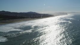 5K aerial stock footage of flying by Ocean Beach in Outer Richmond District, San Francisco, California Aerial Stock Footage | DFKSF15_043