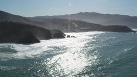 5K aerial stock footage of tilting from the ocean revealing coastal homes, Pacifica, California Aerial Stock Footage | DFKSF15_052