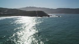 5K aerial stock footage of tilting from the ocean revealing coastal cliffs, Pacifica, California Aerial Stock Footage | DFKSF15_053