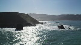 5K aerial stock footage of flying over rock formations by coastal cliffs, Pacifica, California Aerial Stock Footage | DFKSF15_054