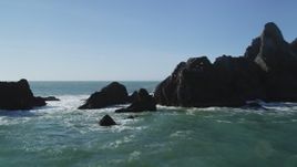 5K aerial stock footage of flying low over rock formations, Pacifica, California Aerial Stock Footage | DFKSF15_058