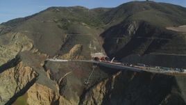 5K aerial stock footage of flying by Highway 1 along coast and a tunnel under construction, Pacifica, California Aerial Stock Footage | DFKSF15_059