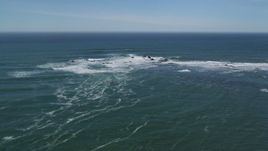 5K aerial stock footage of descending toward waves crashing into rock formations, Half Moon Bay, California Aerial Stock Footage | DFKSF15_072