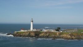 5K aerial stock footage of flying away from Pigeon Point Light Station in Pescadero, California Aerial Stock Footage | DFKSF15_098