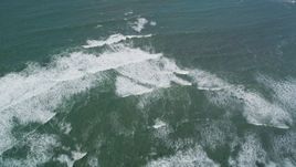 5K aerial stock footage of a reverse view of ocean waves near the coast, Pescadero, California Aerial Stock Footage | DFKSF15_100