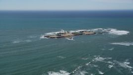 5K aerial stock footage of flying by Año Nuevo Island off the coast of California Aerial Stock Footage | DFKSF15_102