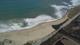5K aerial stock footage flyby the Highway 1 coastal road, revealing a beach, Davenport, California Aerial Stock Footage | DFKSF15_110