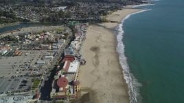 5K aerial stock footage of orbiting the beach and rides at Santa Cruz Beach Boardwalk, Santa Cruz, California Aerial Stock Footage | DFKSF15_134