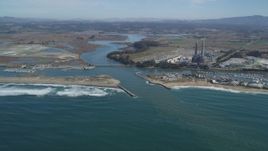 5K aerial stock footage of a power plant with smoke stacks near a beach, Moss Landing, California Aerial Stock Footage | DFKSF15_147