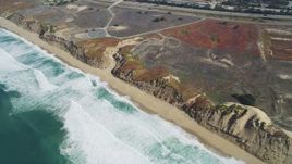 5K aerial stock footage flyby beach and sand dunes at Fort Ord Dunes State Park, Moss Landing, California Aerial Stock Footage | DFKSF15_151