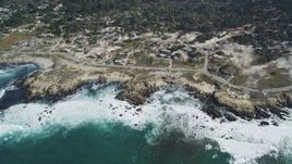 5K aerial stock footage of flying by coastal homes on Sunset Drive, Pacific Grove, California Aerial Stock Footage | DFKSF16_014