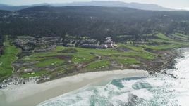 5K aerial stock footage of flying by a coastal resort and golf course, Pebble Beach, California Aerial Stock Footage | DFKSF16_015