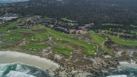 5K aerial stock footage flyby a coastal hotel and resort with golf course in Pebble Beach, California Aerial Stock Footage | DFKSF16_016