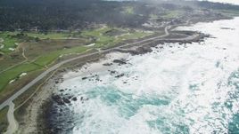 5K aerial stock footage of a coastal road and golf course in Pebble Beach, California Aerial Stock Footage | DFKSF16_018