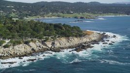 5K aerial stock footage of flying by oceanfront homes and coastline, Pebble Beach, California Aerial Stock Footage | DFKSF16_026